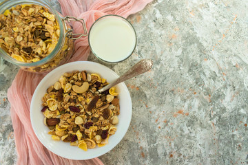 
Granola Continental Breakfast with Dried Fruits and Nuts. Flat Layout, Copy Space.