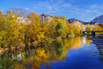 Fototapeta na wymiar Autumn colours around the Arve River in Geneva, Switzerland, Europe