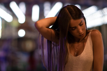 beautiful and elegant girl touching her hair