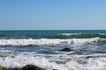 waves crashing on the beach