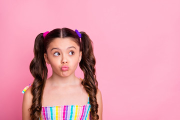Photo of beautiful pretty funny little lady two cute curly tails look interested side empty space...