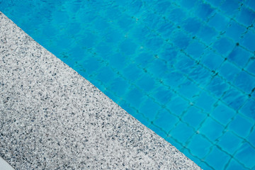 Pure blue water the pool. Water caustic background