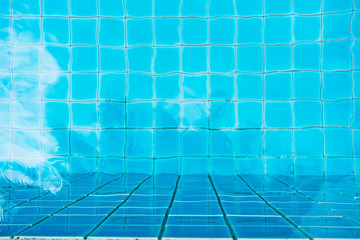 Pure blue water the pool. Water caustic background