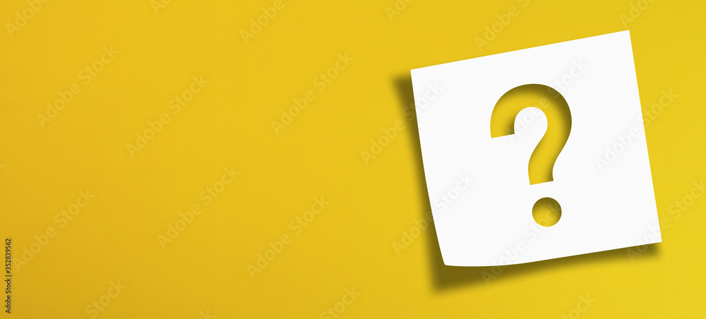 Wall mural note paper with question mark on panoramic yellow background