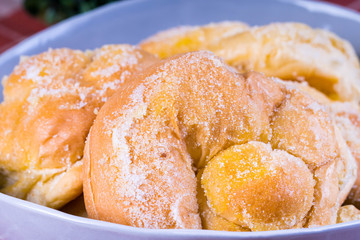 Filipino style of ensaymada; a bread with margarine and white sugar