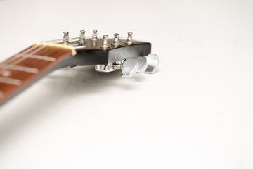 Electric Guitar detail of head and tuner ideal for music lessons signs