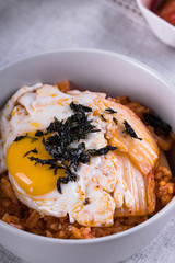 kimchi fried rice with fried egg and nori