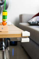 a rubber cushion for corners that protects bumping your child's head 