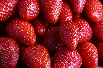 fragrant strawberry berries on the store counter