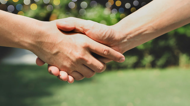 Business Partners  shaking hand and Greeting Start up new project or complete mission successful deal together ,Teamwork of  the nature concept