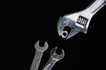 Carob wrench as it passes the nut to the other two carob wrench