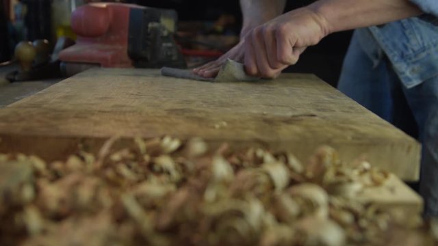 Carpenter while working in his workshop