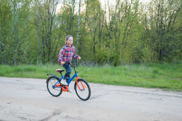 Fototapeta premium little girl on a Bicycle