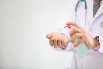 Doctor hands washing with hand sanitizer gel. clean hands hygiene Covid19 spread prevention