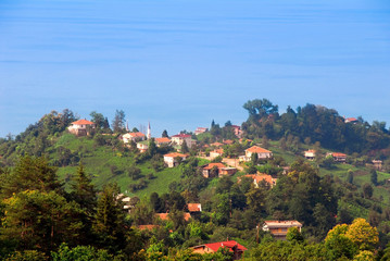 TRABZON, TURKEY - JUNE 28, 2008: Bastimar Quarter, Tea plantations and Black Sea. Surmene District