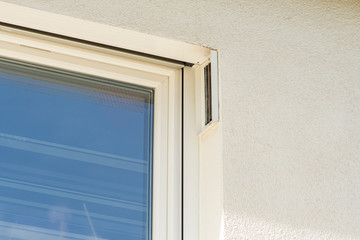 indirect ventilation system installed in the window of a new house