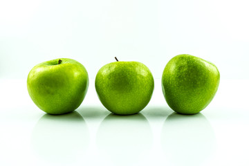 Green apples isolated on white background