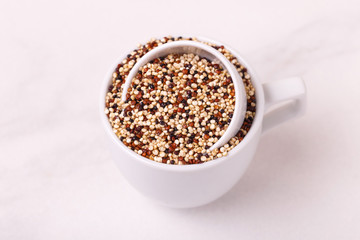 Mix red, black and white quinoa grains, superfood
