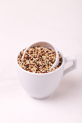 Mix red, black and white quinoa grains, superfood