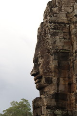 Fototapeta na wymiar Profil du visage de Bouddha, temple Bayon à Angkor, Cambodge