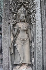 Fototapeta na wymiar Sculpture du temple Bayon à Angkor, Cambodge