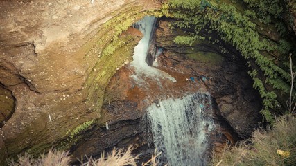 A close up of small watterfall view