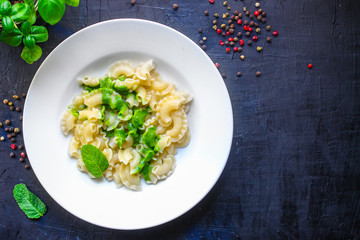 pasta green sauce pesto creste di galli Menu concept healthy food background top view copy space for text healthy eating