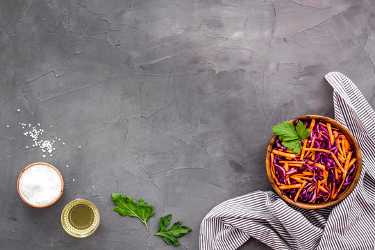 Healthy Vegan Salad With Red Cabbage On Grey Kitchen Table Top View Copy Space