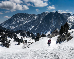 Girl hiking in snowy mountain