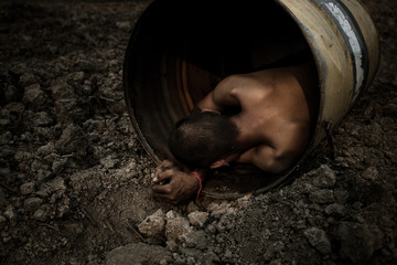 poor people,homeless or beggar begging for help sitting at dirty slum.concept for poverty hunger,human rights,donate and charity for underprivileged children in third world