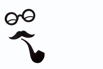 Men's accessories and attributes, tube, glasses and mustache. Place for text. Postcard. Father day