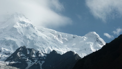 Close up of a mountin with snow and cloud