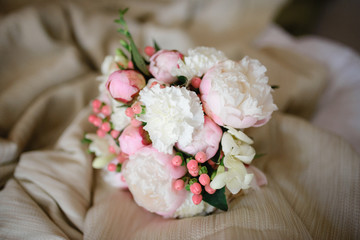 Bridal bouquet on a beige background.