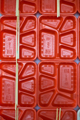 Orange plastic food takeawy trays