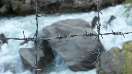 Close up of wire gates by the river
