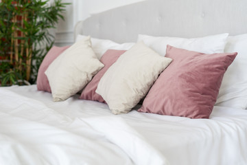 Obraz premium Cozy bedroom with soft and comfort bed