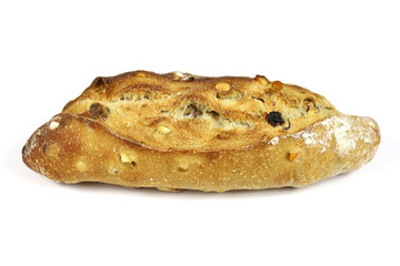 pain aux fruits et noisettes sur un fond blanc