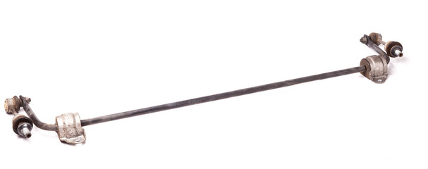 Metal anti-roll bar - a device in vehicle’s suspension that serves to reduce lateral rolls in corners; it was used on a white isolated background in photo studio for installation or repair in workshop