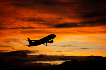 Fototapeta premium Sunset plane