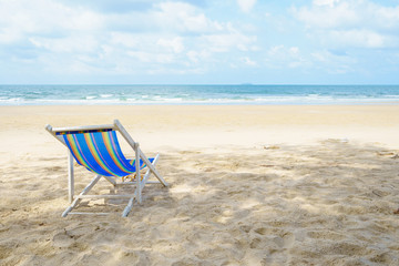 chairs on the beach near the sea. enjoying looking view of sea with blue sky on summer vacation and travel holiday concept.