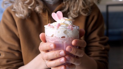 Woman Drinking Glass Of Pink Latte With Beetroot Juice, Plant Milk. Healthy Vegan Drink.