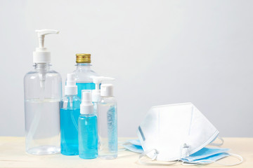 Bottle of hand sanitizer alcohol gel clear liquid plastic pump. antiseptic and mask prevent the spread of germ and bacteria antibacterial hygiene and avoid infection corona virus, covid 19 protection.