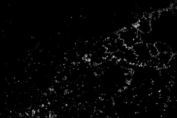 Splashes and drops of water are on a black background.