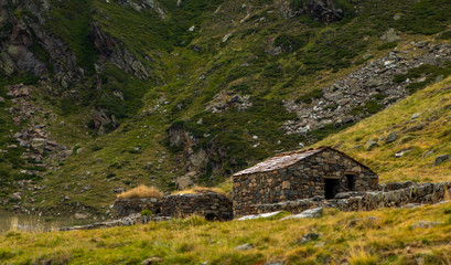 stone built refugee in mountains landscape