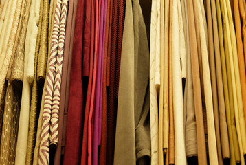 Rolls of fabric and textiles in store