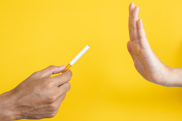 World No Tobacco Day, May 31. Just Say No To Stop Smoking. Close Up Man Hand Reject Cigarette Offer