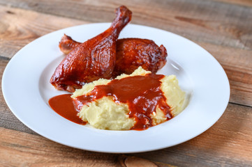 Barbecue duck legs with mashed potato