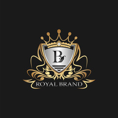 B Letter Gold Shield Logo. Elegant vector logo badge template with alphabet letter on shield frame ornate vector style  design.