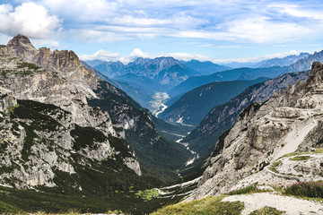 Fototapeta na wymiar Mountain valley in the Italian Dolomites. Mountain valley in the Italian Dolomites.