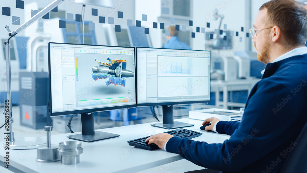 Poster Industrial Engineer Working on a Personal Computer, Two Monitor Screens Show CAD Software with 3D Prototype of Hybrid Electric Engine and Charts. Modern Factory with High-Tech Machinery